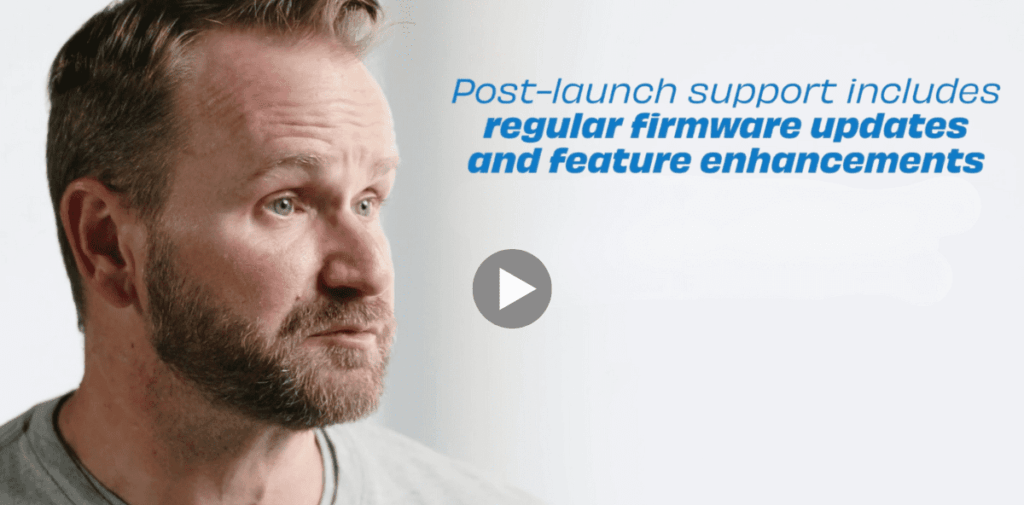 Man with beard discussing post-launch support for medical devices, emphasizing regular firmware updates and feature enhancements.