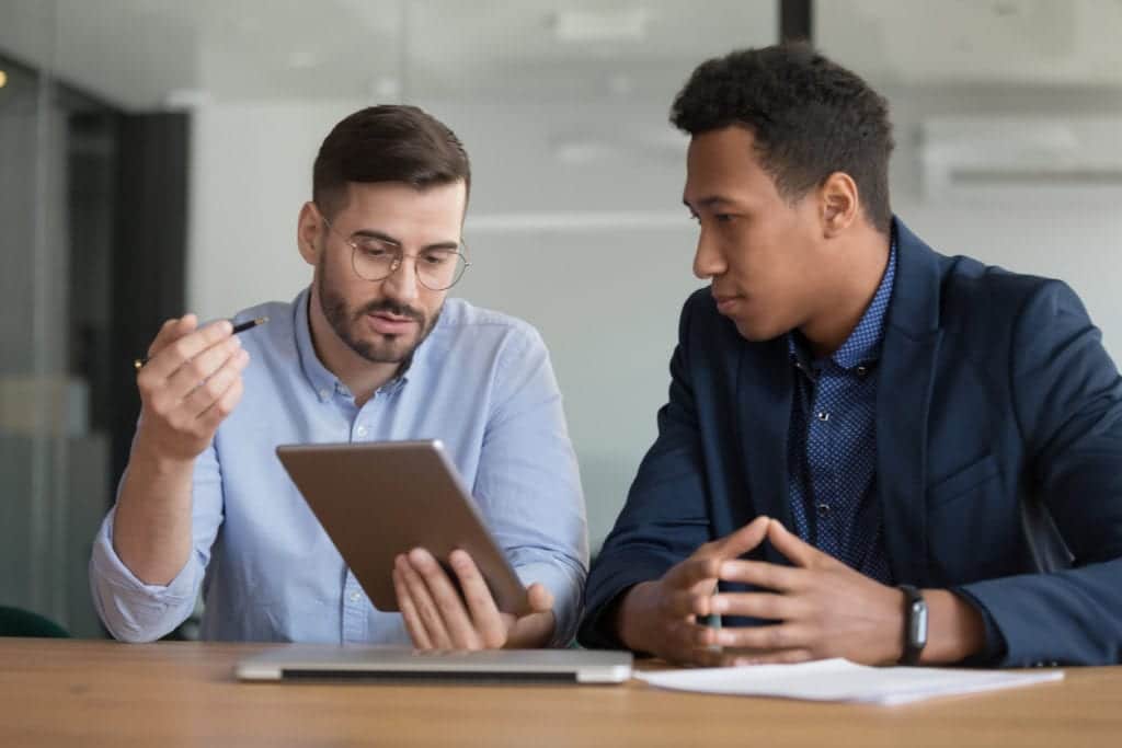 Business man talking to a medical device consultant
